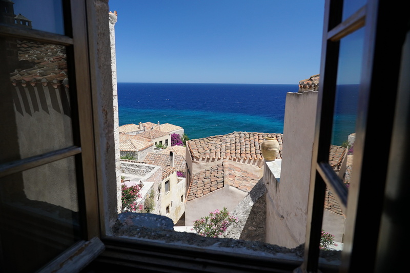 glass - material, water, monemvasia, island, landscape, horizon over water, sky, sea, nature, outdoors, horizon, architecture, clear sky, beauty in nature