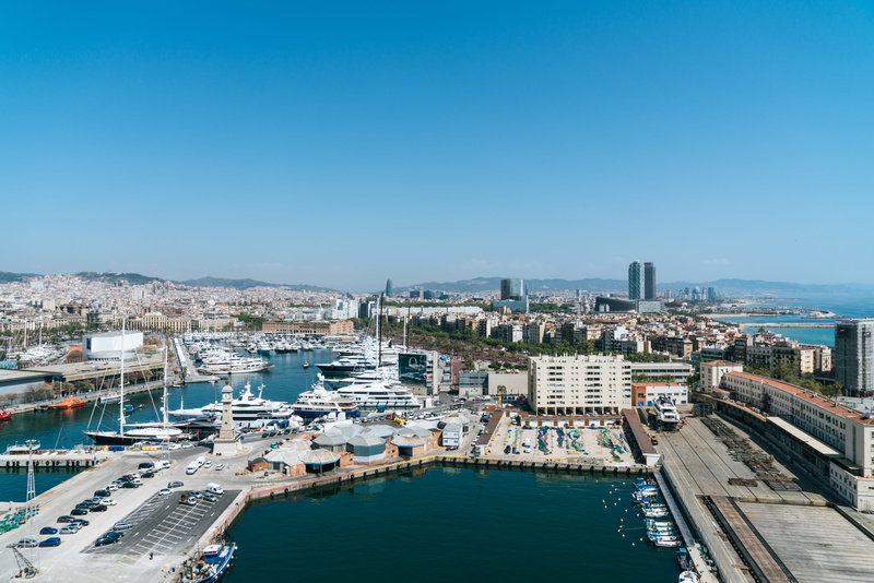 spain, skyscraper, blue, sea, high angle view, trees, water, clear sky, nature, office building exterior, construction, cars, port, paolo nicolello, built structure