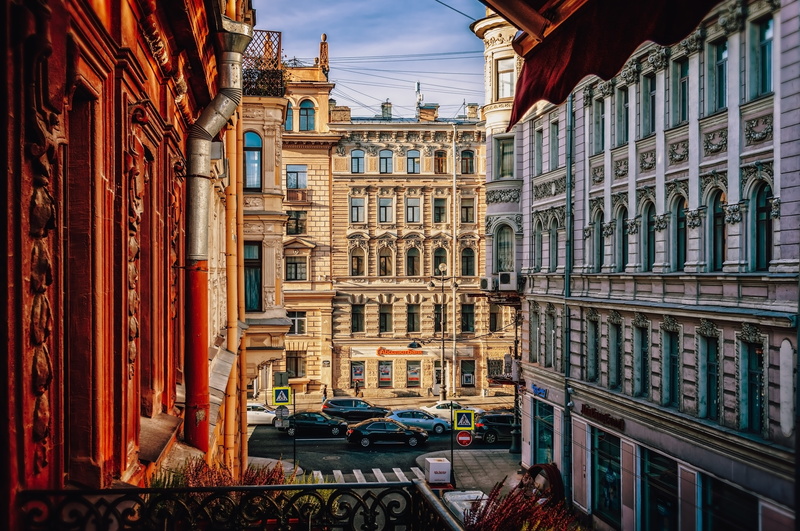 outlook, road, art era, nature, art nouveau, building exterior, land vehicle, morning, sun, historic center, car, outdoors, motor vehicle, human, day, street
