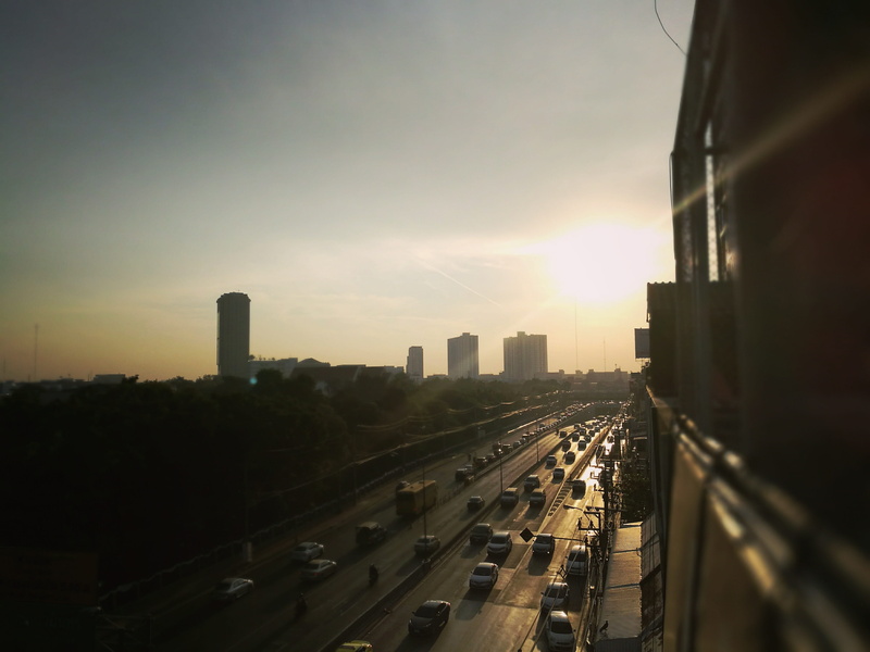 skyscraper, sky, outdoors, sun, building exterior, Dawn, Street, nature, building, the car, Sun, transportation, Chaos, office building exterior, high angle view