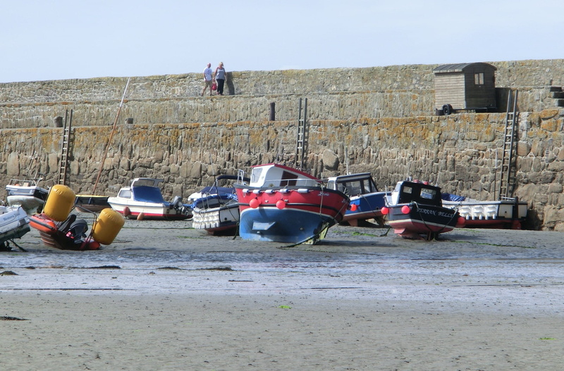 sea, day, Ebb, land vehicle, incidental people, architecture, outdoors, abandoned, wall - building feature, Boats, England, real people, transportation