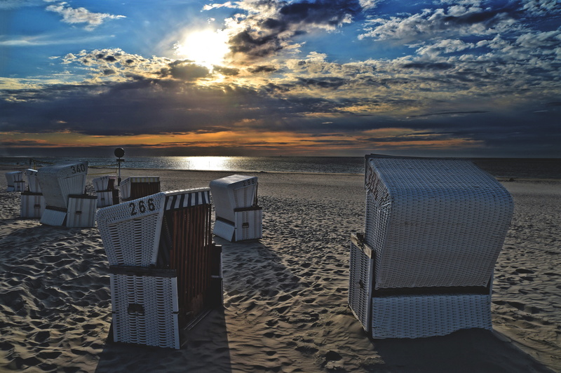 nature, sand, land, sky, beach chair, sunset, no people, sunlight, beauty in nature, 4K, outdoors, tranquil scene, water, clouds, tranquility, idyllic
