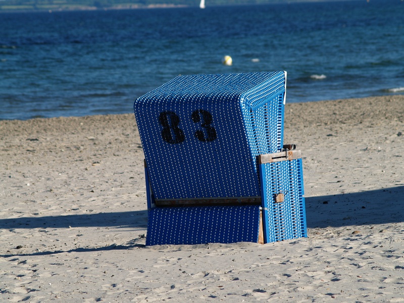 sand, sunlight, summer, number, hooded beach chair, blue, focus on foreground, tranquility, chair, outdoors, absence, baltic sea, day, beach, nature, vacations