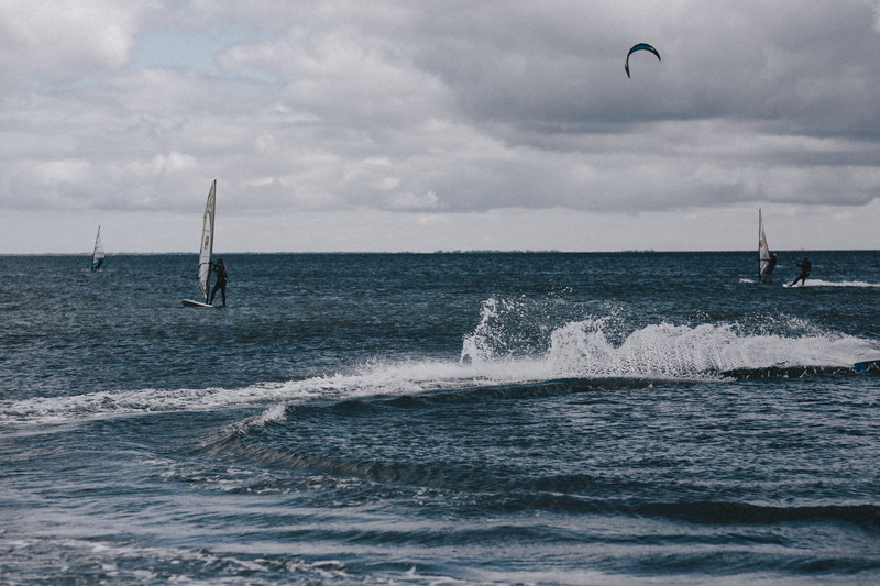 day, surfing, windsurfing, sports, sport, people, waterfront, shore, nautical Vessel, recreational Pursuit, aquatic sport, beauty in nature, extreme Sports