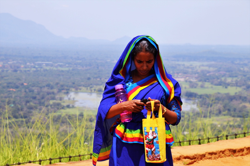 day, real people, holding, sri lanka, leisure activity, lifestyles, scenery, boiling hot, view, scarf, photo, tote, waist up, bag, indian saree, sms, girl