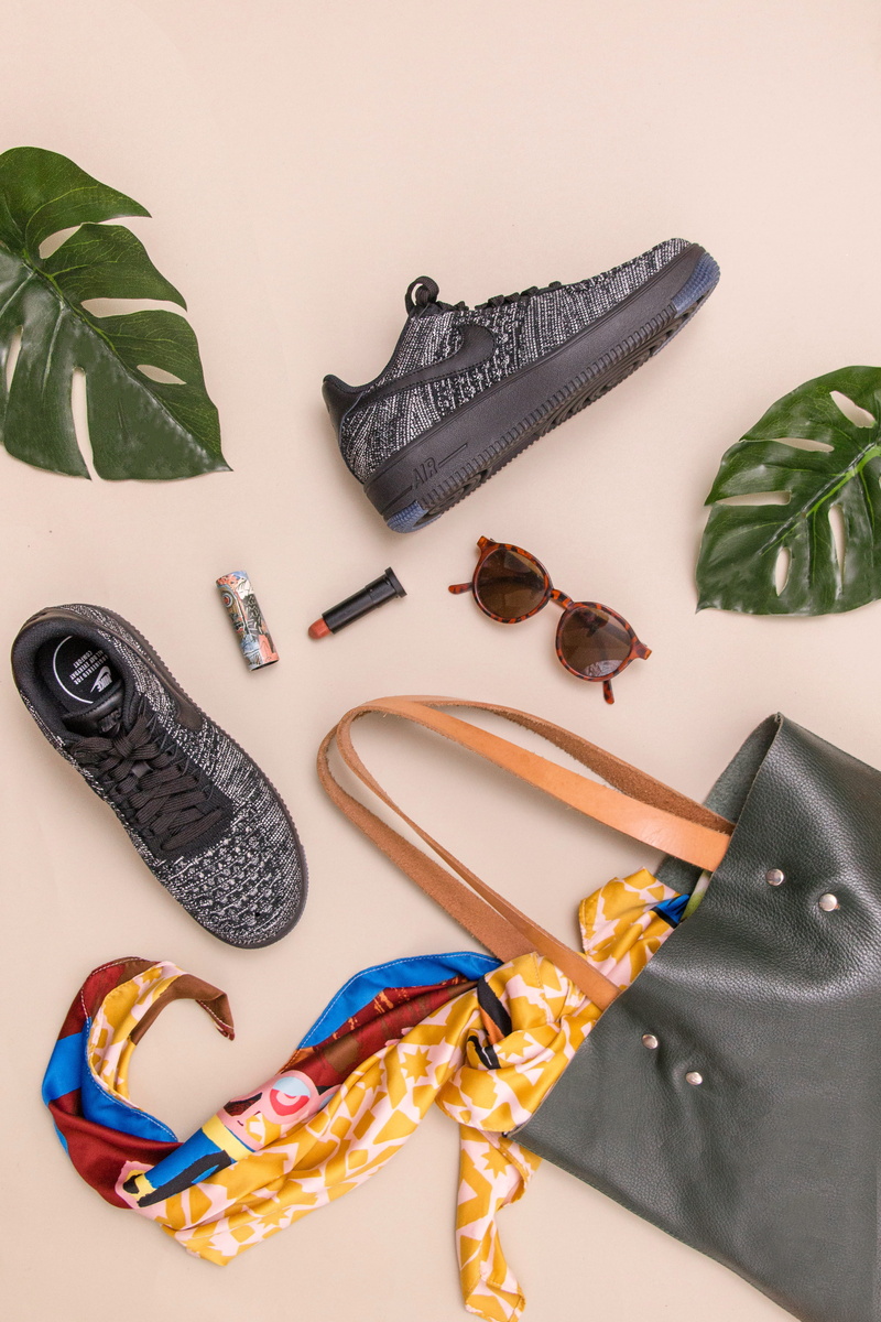group of objects, leather, surface, variation, studio shot, black color, beside, flatlay, beige, tool, nike, choice, close-up, bag, indoors, still life