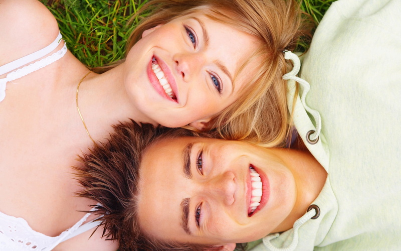 one Person, enjoyment, headshot, teeth, beautiful People, real People, looking At Camera, lying Down, bonding, carefree, lifestyles, two People, lying On Back