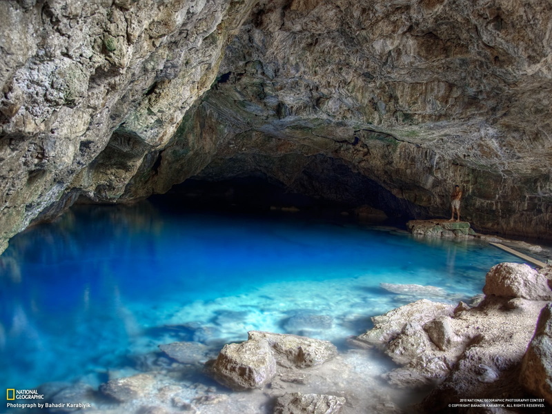 eroded, outdoors, rock formation, cave, National Geographic, non-urban scene, idyllic, rock - object, scenics - nature, beauty in nature, no people, blue