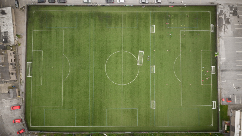 competition, drone view, competitive sport, playing field, sport, green color, no people, pitch, outdoors, soccer field, aerial, 2K, day, architecture
