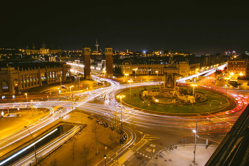 building exterior, cityscape, park, transportation, built structure, outdoors, time, lighted, night, mode of transportation, speed, lapse, illuminated