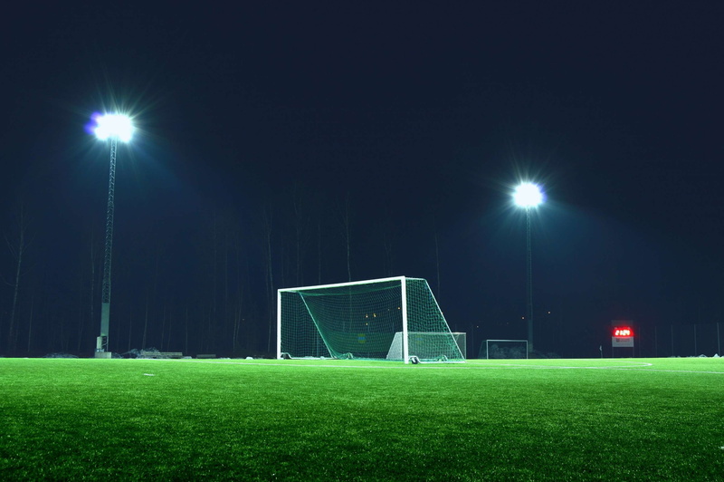 plant, team sport, soccer goal, evening, grass, lights, green, field, no people, stadium, green color, sport, floodlight, goal, lens flare, football, outside