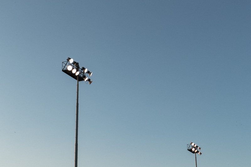 arts culture and entertainment, electric, pole, low angle view, stadium light, field light, symetry, outdoors, los angele, blue, sky, la, copy space, street light
