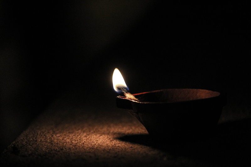electric lamp, brown, indoors, oil lamp, diya - oil lamp, no people, burning, close-up, holder, flame, copy space, single object, candle, heat - temperature