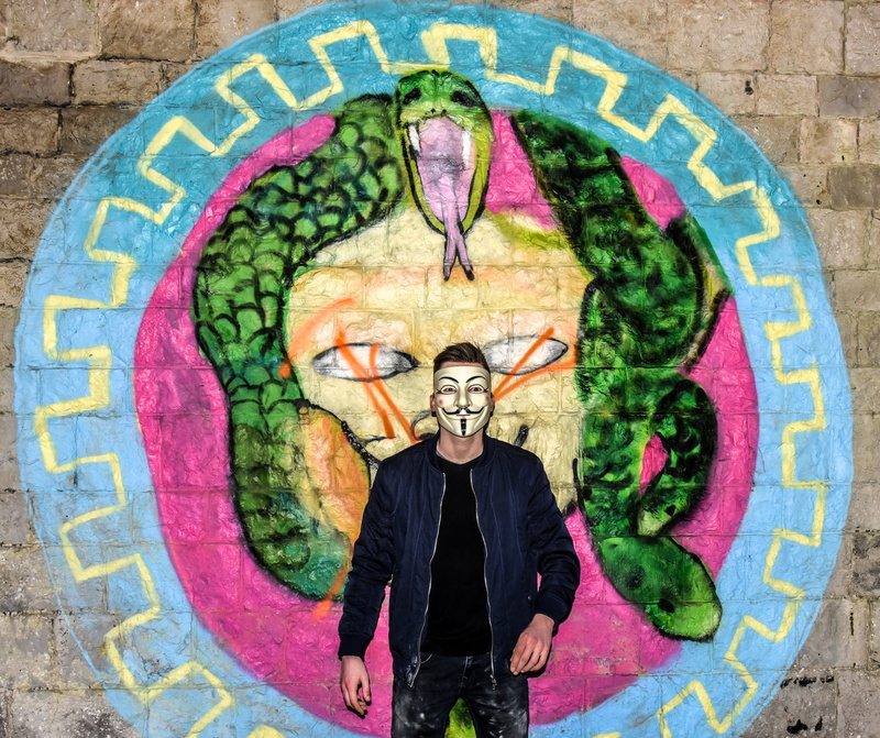 lifestyles, people, explorer, teen, urban, front view, wall, day, graffiti, the construction, casual clothing, young adult, men, dirt, mural, portrait