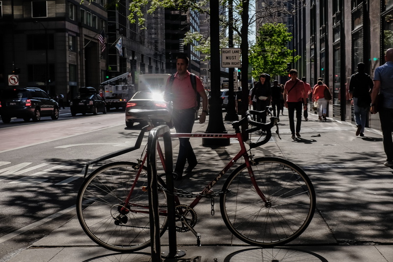 black, summer, architecture, people, parked, motor vehicle, lifestyles, sidewalk, real people, bike, men, built structure, pavement, outdoor, transport