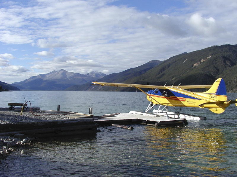 canada, Lake, water, beauty in nature, tranquility, transportation, yellow, boat, mountain, no people, day, Float Plane, sky, mode of transportation, Yukon Territory