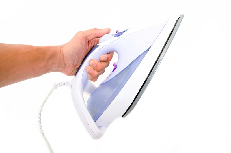 clothes, hand, ironing, clothing, cloth, finger, body part, equipment, iron, violet, flatiron, fabric, electric, steel, white, object, isolated, human body part