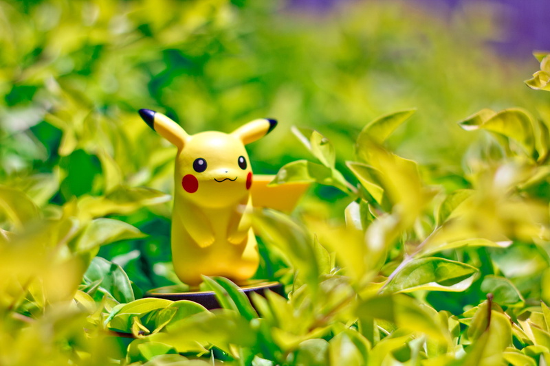 Nintendo, amiibo, toys, pokemon, daytime, cute, Shallow, Pokémon  Pikachu, green Color, nature, figure, animal, standing, pikachu, on plants, photography