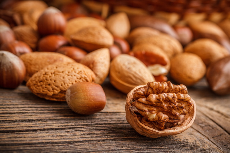 healthy eating, nut, focus on foreground, almond, almonds, brown, nuts, fruit, indoors, forest, table, no people, snack, wood - material, selective focus