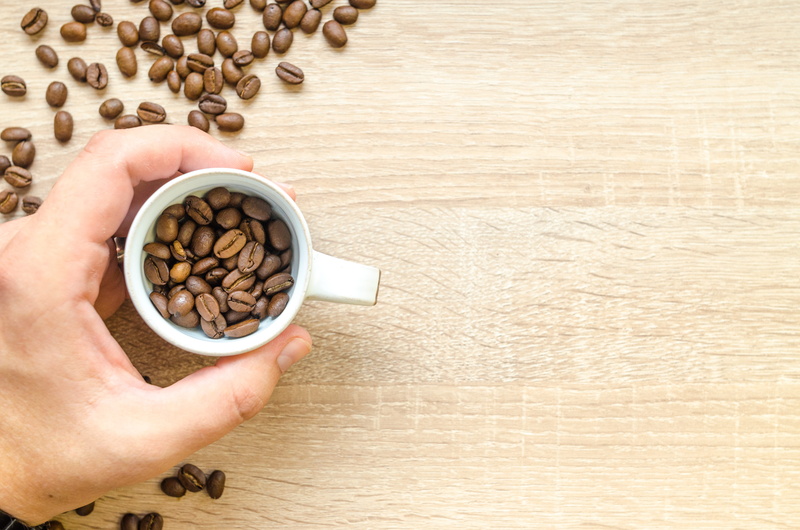 top view, coffee, wooden, aromatic, hold, body part, cup, close-up, coffee beans, drink, real people, roasted coffee bean, 4K, non-alcoholic beverage