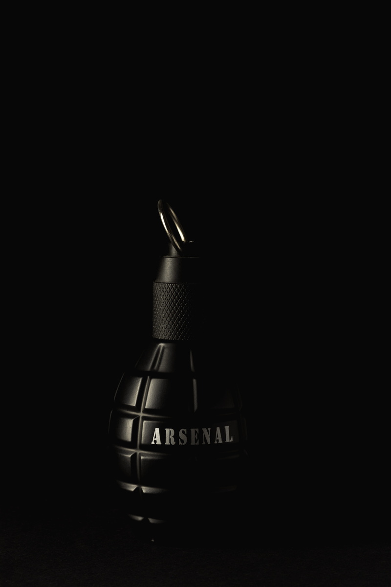 bottle, still life, security, single object, 5K, technology, equipment, lighting, lighting equipment, black background, medellín, table, black, close-up