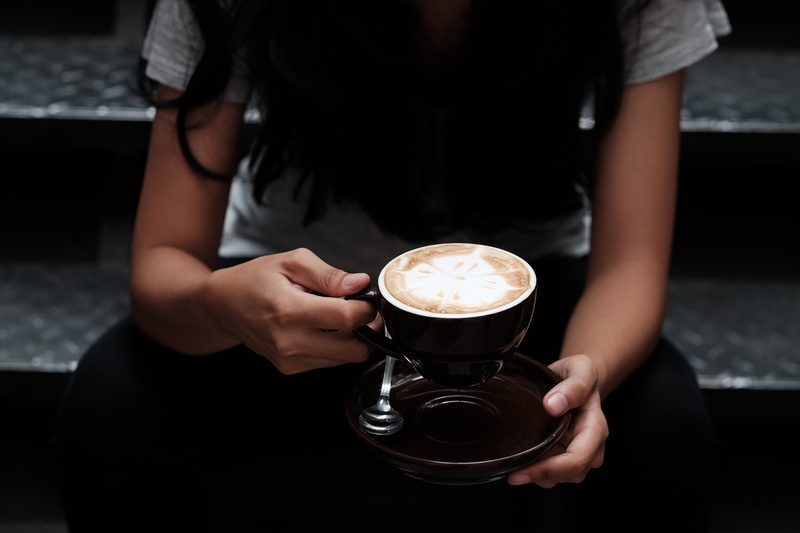 espresso, cup, one person, front view, brown, hot drink, young Adult, cafe, coffee Break, real people, drink, latte, heat - Temperature, table, focus on foreground