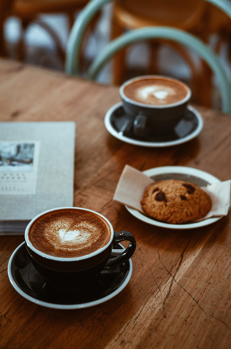 drink, snack, cappuccino, frothy drink, mug, black, coffee mug, food and drink, espresso, no people, latte, cookie, coffee - drink, table, teacup, crockery