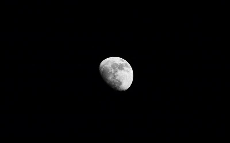 planetary moon, Moon, night, outdoors, nature, sky, black background, astrology, tranquil scene, photography, monochrome, moon surface, astronomy, majestic