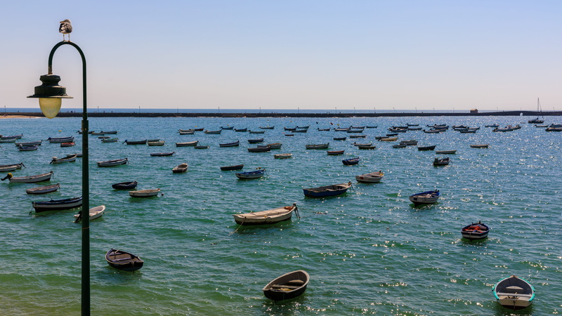 tranquil scene, mediterranean, wooden post, waterfront, blue, 4K, spain, boat, transportation, scenics - nature, clear sky, lighting equipment, beauty in nature