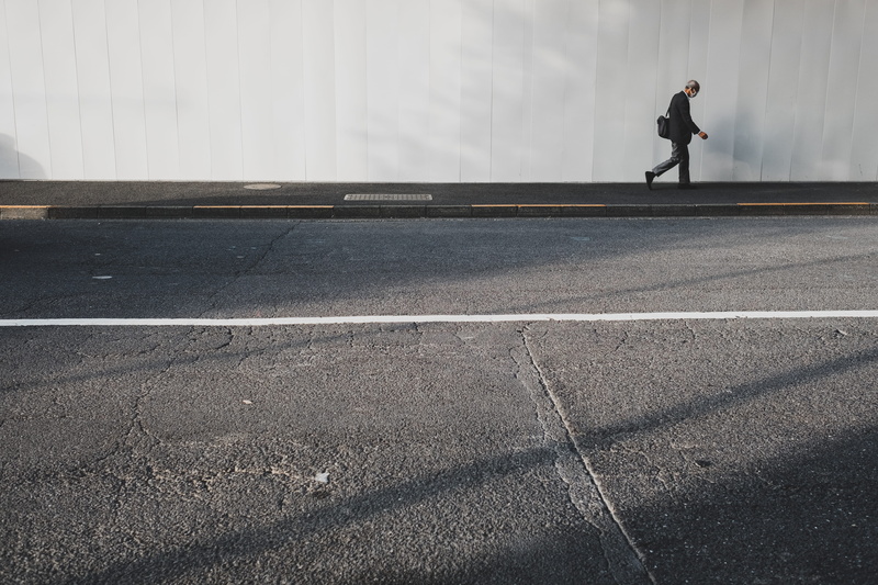 urban, marking, white, person, symbol, man, 5K, sign, sunlight, outdoors, casual clothing, full length, street, walk, walking, road, day, real people