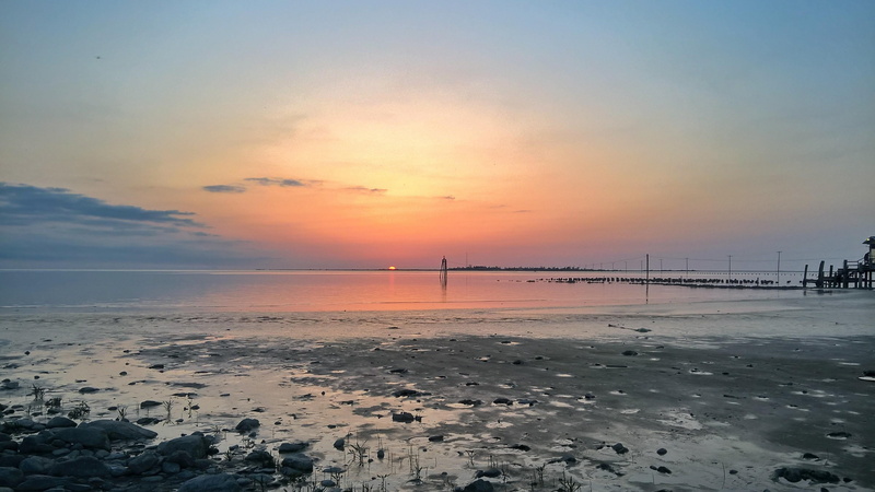 tranquil scene, tranquility, land, sky, sun, idyllic, low tide, water, horizon, sea, scenics - nature, beach, cloud - sky, non-urban scene, outdoors, horizon over water