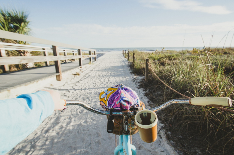 ocean, railing, gulf of mexico, united states, florida, sea, day, bike, outdoors, grass, mode of transportation, land, vacation, coast, container, no people