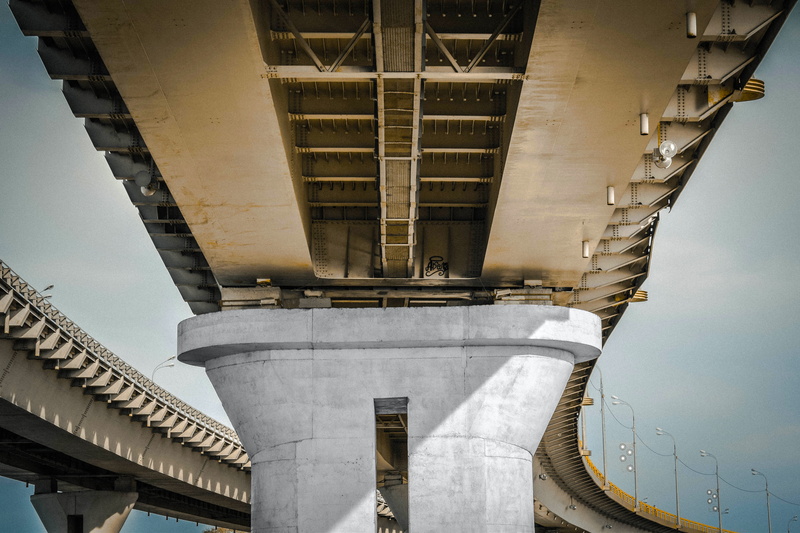 metal, day, urban, outdoors, perspective, bridge - man made structure, low angle view, directly below, steel, concrete, clear sky, underneath, no people