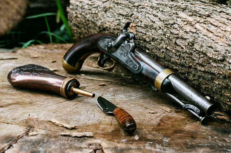 communication, weapon, weapons, vintage, table, brown, retro, wood - material, high angle view, flintlock, close-up, sign, man made, warning sign, indoors