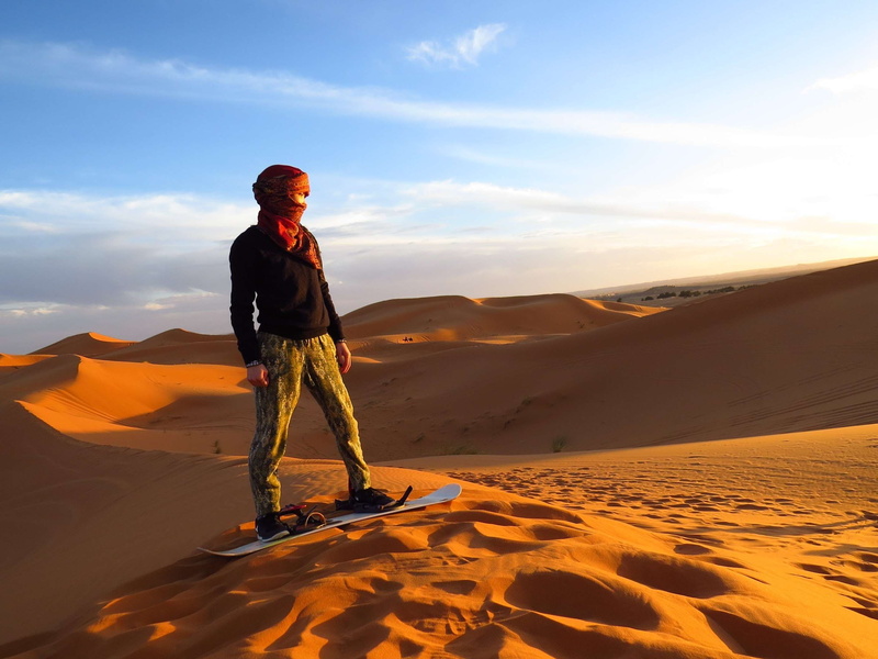 land, real people, one person, tranquil scene, desert, country, sandboarding, climate, environment, arid climate, non-urban scene, travel, sand dunes, scenics - nature