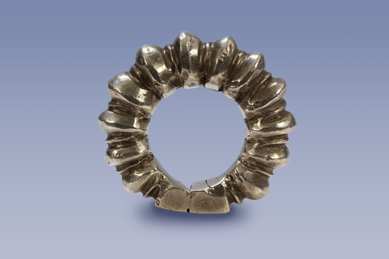 shiny, Carved, mali, Trailers, Bead, studio shot, archaic, tribe, fuel and power generation, finance, shape, blue background, ritual, bead ring, wealth