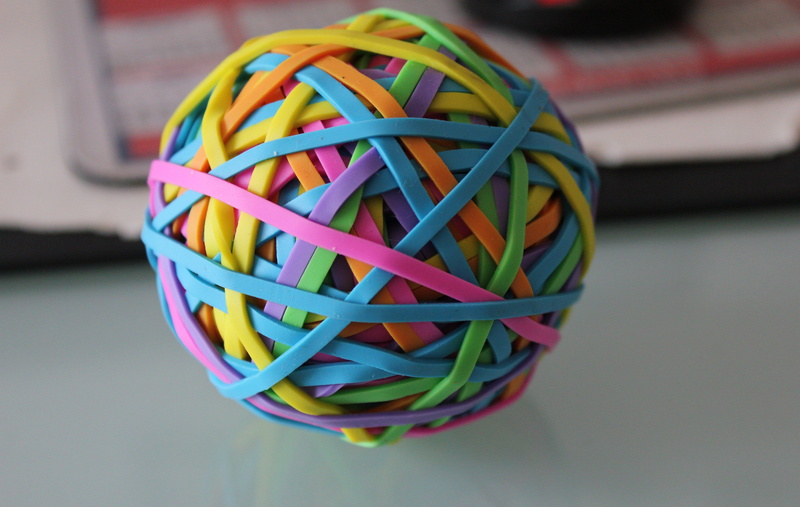 multi colored, complexity, desk, abundance, table, office accessories, no people, 5K, header, sphere, electrical equipment, flexible, rubber, bind, focus on foreground