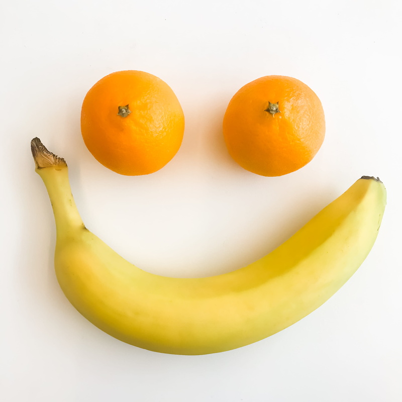 freshness, yellow, face, ripe, no people, close-up, pasadena, white background, two objects, studio shot, banana, food and drink, indoors, wellbeing, food