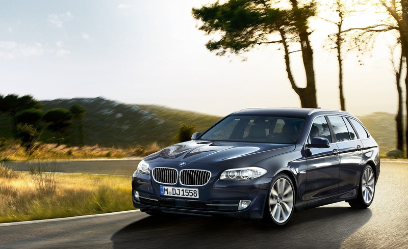 mode of transportation, station, bmw 5, design, front angle, road, car, land vehicle, touring, f, exterior, tree, sunlight, reflection, outdoors, luxury