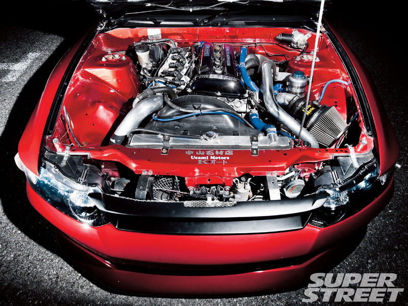 shiny, motor vehicle, engine, land vehicle, motorcycle, mode of transportation, high angle view, metal, vehicle part, red, Nissan, indoors, transportation