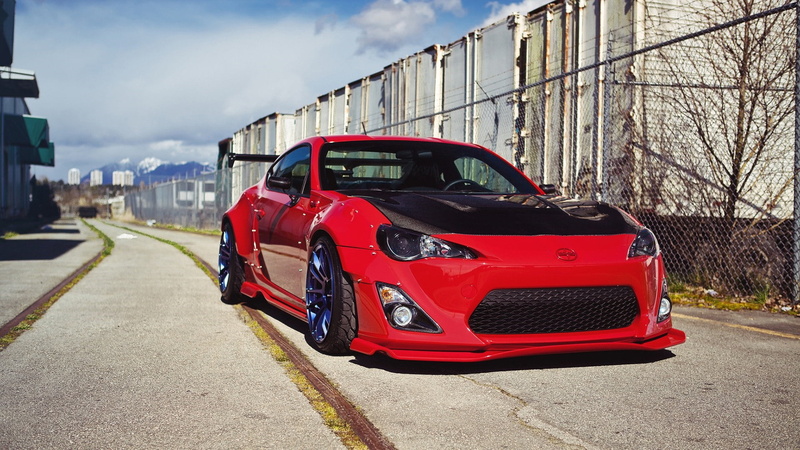 nature, motor vehicle, incidental people, sports car, street, toyota 86, car, outdoors, toyota gt86, mode of transportation, sky, 1080P, building exterior