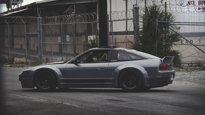 mode of transportation, control, 240sx, architecture, 1080P, stationary, building exterior, modern, motor vehicle, car, outdoors, day, city, land vehicle