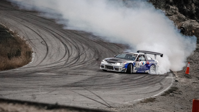 hill, day, smoke, nissan, traffic, track, motorsport, land vehicle, transportation, sx, driving, car, 2K, near, dust, curve, dirt, land, white, blue, rally