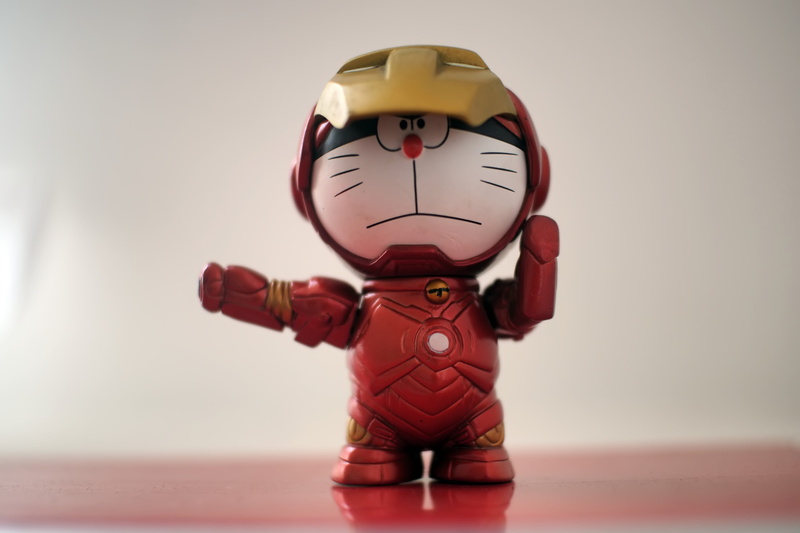 wall - building feature, figurine, helmet, video, cartoon, television, anime, childhood, colored background, male, small, people, representation, man, iron