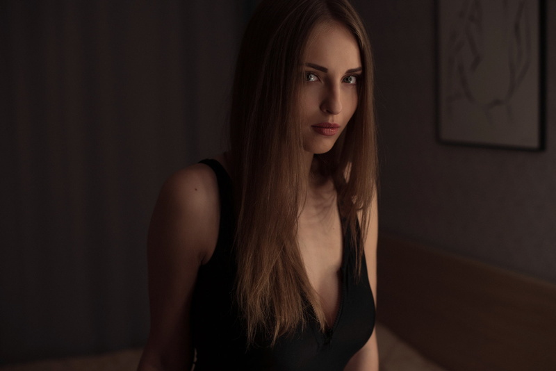 contemplation, waist up, adult, women, black clothing, brown hair, women indoors, hairstyle, front view, young adult, brunette, beautiful woman, long hair
