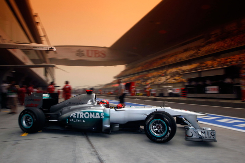 Shanghai International Circuit, black, transportation, police car, architecture, incidental people, Sport, motion, sign, The pit lane, built structure