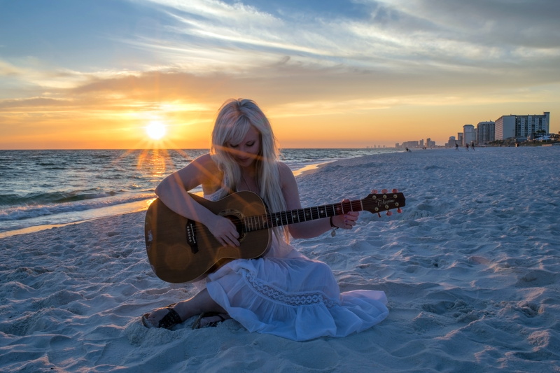 ocean, nature, fun, adult, women, caucasian, music, female, musical, horizon over water, sky, 5K, happy, woman, performer, sunset, land, sitting, guitarist