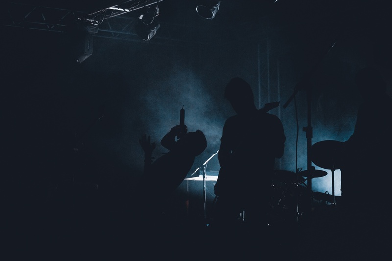 musical equipment, hostile, lighting, men, light - natural phenomenon, guitar, show, musical instrument, dark, sing, arts culture and entertainment, indoors