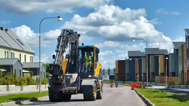 engineering, construction, vehicle, sky, building exterior, container, heavy, built structure, excavator, freight transportation, transportation, driving