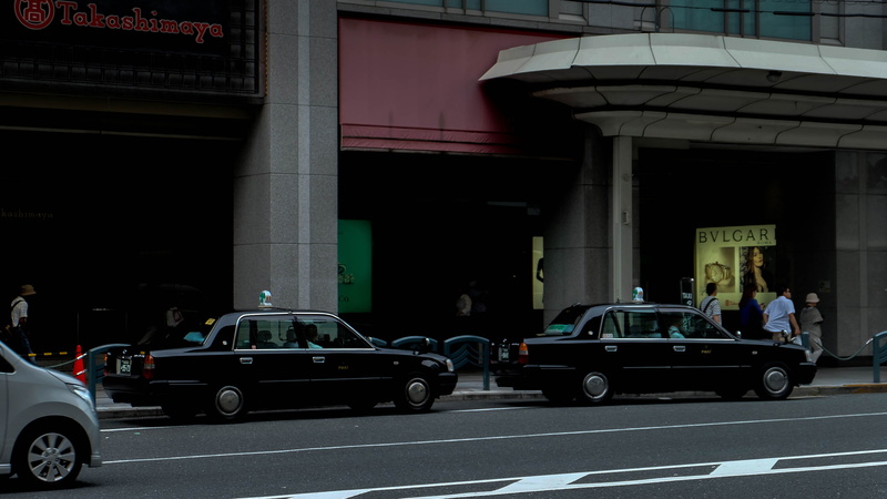 incidental people, japan, outdoors, car, street, text, osaka, kyoto prefecture, road, city, taxi, 2K, ykoto, sign, architectural column, real people